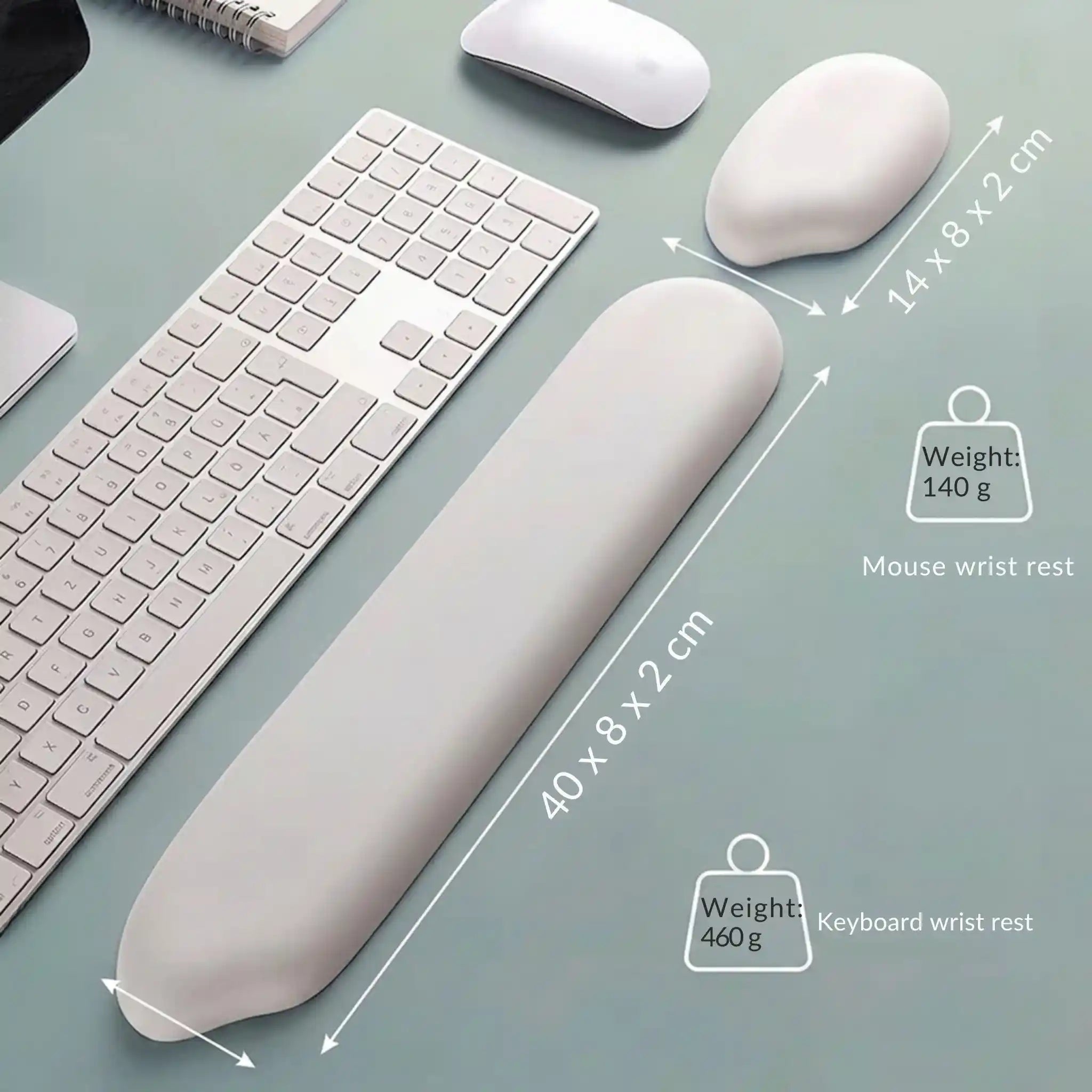 Dimensions chart showing the length and thickness of both the keyboard wrist rest and matching mouse pad rest.