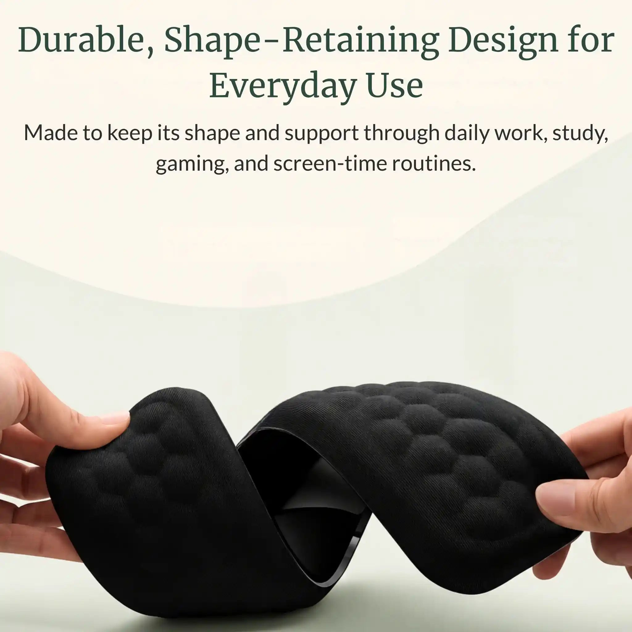 Close-up demonstration of a hand pressing into the slow-rebound memory foam material of the RelievoCare Wrist Rest.